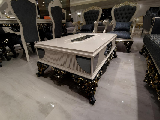 Luxe woonkamerset met 2x 3-zitsbanken, twee fauteuils en salontafel.