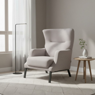 Witte stoffen fauteuil gestoffeerd eenzitter armleuning fauteuil woonkamer zitmeubel