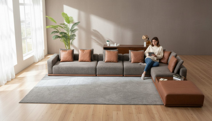 Grijze woonkamer zithoek hoekbank designstoffen bankstel