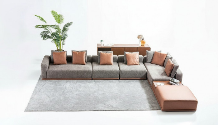 Grijze woonkamer zithoek hoekbank designstoffen bankstel