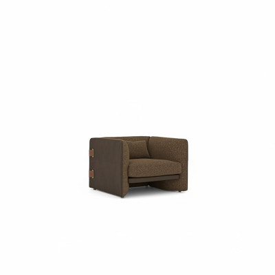 Bruine fauteuil woonkamer inrichting luxe textiel gestoffeerd meubilair modern design.