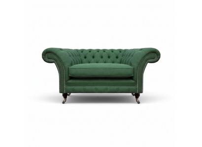 Elegante Chesterfield groene fauteuil woonkamer textiel edele eenzits.