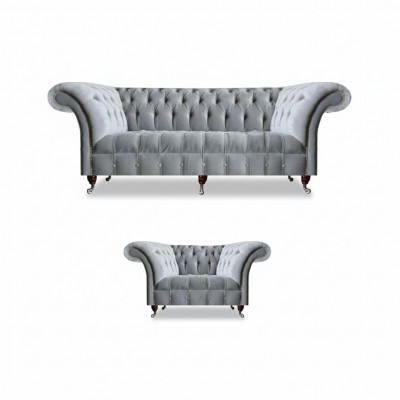 Complete grijze Chesterfield zitmeubelen, stijlvolle leunstoel en 3-zits bank.