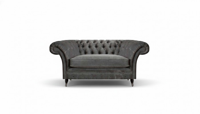 Luxe grijze Chesterfield fauteuil gestoffeerde designstoel