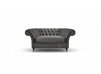 Luxe grijze Chesterfield fauteuil gestoffeerde designstoel