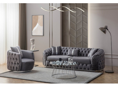 Das Sofa mit Sessel ergänzt die Einrichtung mit Ästhetik und Stil.